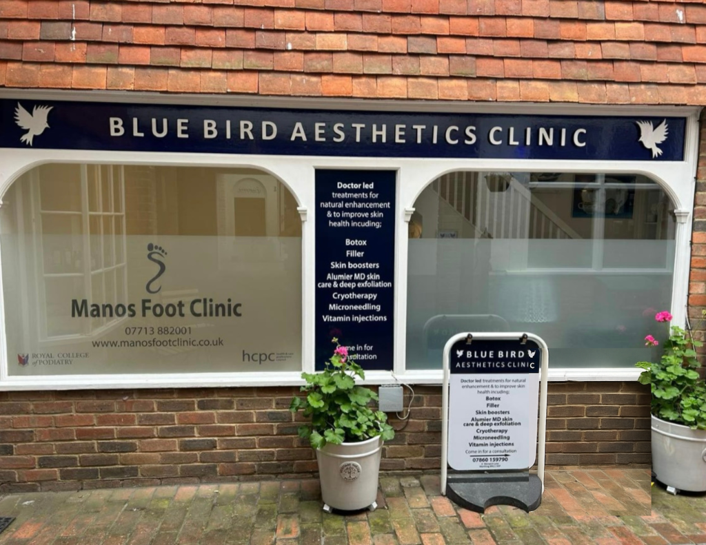 Exterior of Blue Bird Aesthetics clinic in Worthing, showing clear signage and the entrance to the practice.