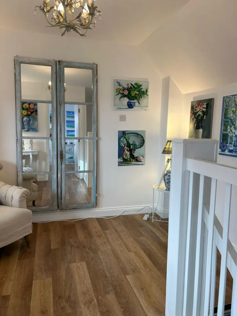 Bright hallway inside Blue Bird Aesthetics clinic in Worthing, showing a clean and welcoming interior.
