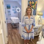 Dr Halliday standing outside the clinic room at Blue Bird Aesthetics
